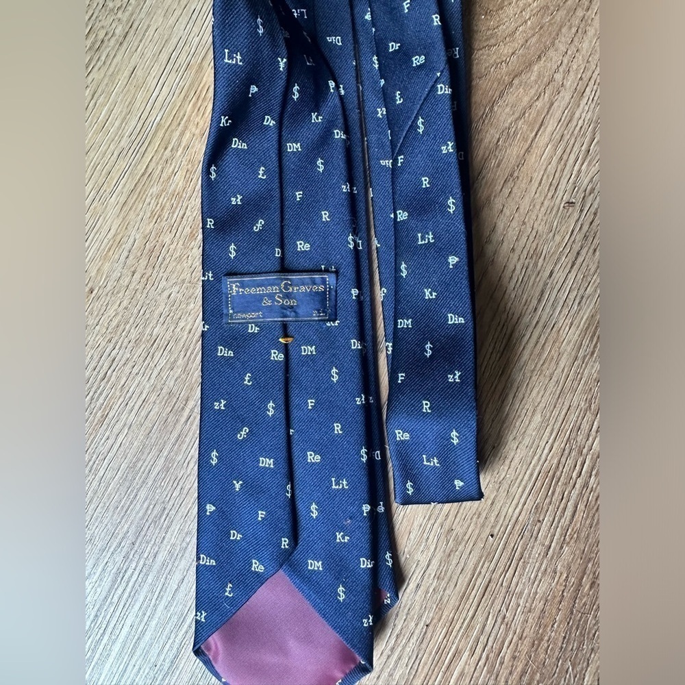 Navy blue Freeman Graves & Son men’s tie with world currency symbols. Skinny tie - Picture 3 of 4